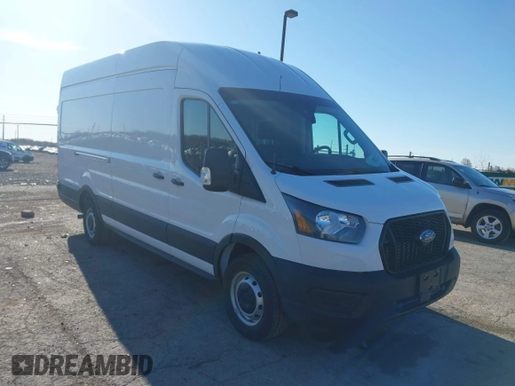 2024 Ford Transit Cargo z VIN 1FTBW3X89RKB49268, wystawiony jako IAAI lot #42081360 z przebiegiem 7 290 mil mil oraz . Historia ofert i sprzedaży dostępna na DreamBid. Obrazek 1.