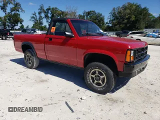 1989 Dodge Dakota z VIN 1B7GG69X9KS181359, wystawiony jako Copart lot #75638874 z przebiegiem 104 095 mil mil oraz Szkoda całkowita • Salvage title. Historia ofert i sprzedaży dostępna na DreamBid. Obrazek 4.