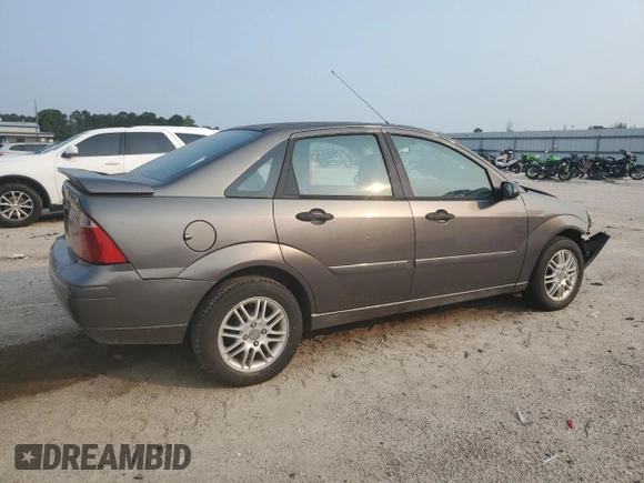 2006 Ford Focus S с VIN 1FAHP34N06W115926, выставлен на аукционе Copart как лот 59145555 с пробегом 263 717 миль миль и Списание • Salvage title. История ставок и продаж доступна на DreamBid. Изображение 3.