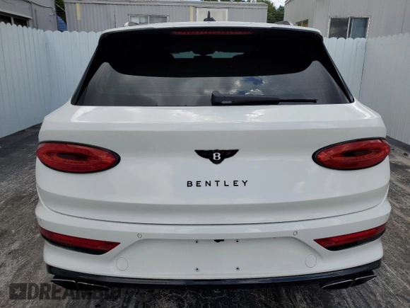 2021 Bentley Bentayga V8 z VIN SJAAM2ZV9MC036858, wystawiony jako Copart lot #41018244 z przebiegiem 29 054 mil mil oraz Nie do naprawy • Non repairable. Historia ofert i sprzedaży dostępna na DreamBid. Obrazek 6.