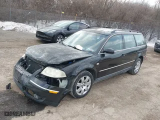 2003 Volkswagen Passat GLX with VIN WVWYH63B23E073924, listed as a IAAI auction lot 41447079 with 160,263 mi miles. Bid and sale history available at carsss.com. Image 2.