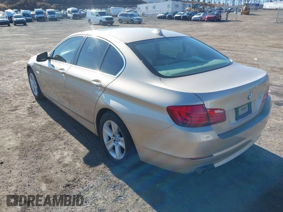 2013 BMW 5 Series 528i with VIN WBAXG5C52DDY33728, listed as a IAAI auction lot 41713841 with 105,963 mi miles and . Bid and sale history available at carsss.com. Image 3.