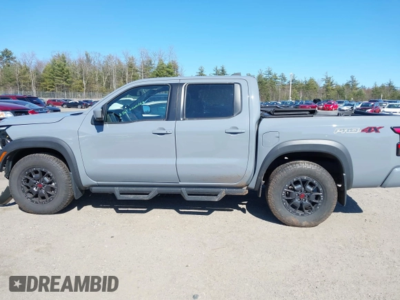 2022 Nissan Frontier SV z VIN 1N6ED1EKXNN659026, wystawiony jako IAAI lot #42050476 z przebiegiem 26 183 mil mil oraz . Historia ofert i sprzedaży dostępna na DreamBid. Obrazek 15.