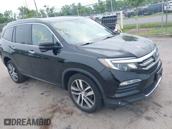 2017 Honda Pilot Touring with VIN 5FNYF6H90HB052474, listed as a IAAI auction lot 42291464 with 103,288 mi miles and . Bid and sale history available at DreamBid. Image 1.