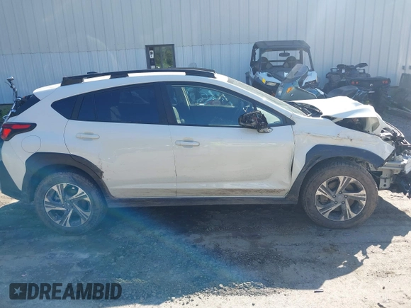 2024 Subaru Crosstrek Premium z VIN JF2GUADC0R8873664, wystawiony jako IAAI lot #42395857 z przebiegiem 11 924 mil mil oraz . Historia ofert i sprzedaży dostępna na DreamBid. Obrazek 13.