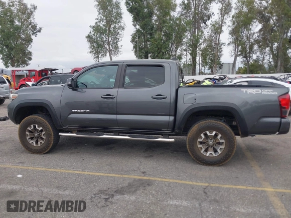 2018 Toyota Tacoma SR5 with VIN 3TMAZ5CN1JM071396, listed as a IAAI auction lot 42061640 with 122,148 mi miles and . Bid and sale history available at DreamBid. Image 14.