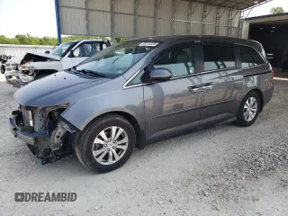 2014 Honda Odyssey EX-L with VIN 5FNRL5H60EB125478, listed as a Copart auction lot 59218355 with 165,928 mi miles and Salvage title. Bid and sale history available at DreamBid. Image 1.