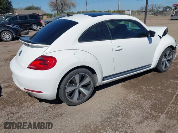 2012 Volkswagen Beetle with VIN 3VWV87AT1CM627756, listed as a IAAI auction lot 41657307 with 81,924 mi miles and . Bid and sale history available at DreamBid. Image 4.