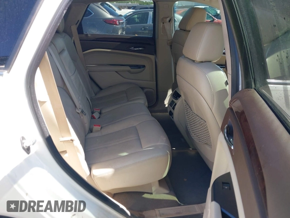 2013 Cadillac SRX Premium Collection with VIN 3GYFNEE33DS554556, listed as a IAAI auction lot 42152972 with 144,668 mi miles and . Bid and sale history available at DreamBid. Image 8.