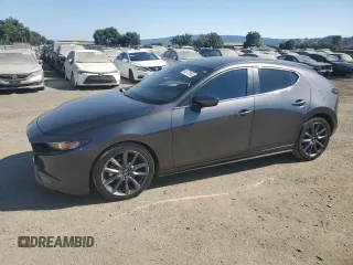 2019 Mazda 3 with VIN JM1BPBJMXK1123383, listed as a Copart auction lot 62372965 with 57,103 mi miles and Salvage title. Bid and sale history available at DreamBid. Image 1.