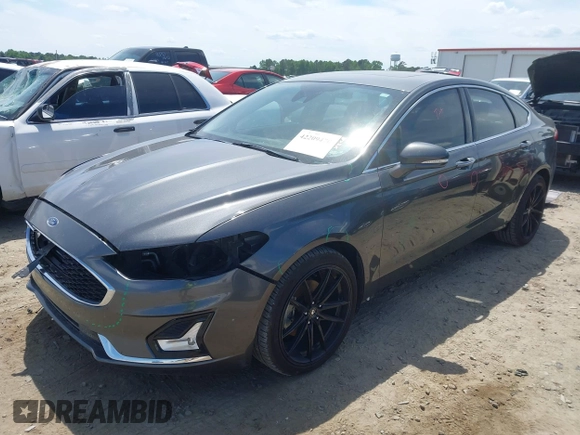 2019 Ford Fusion Titanium with VIN 3FA6P0D9XKR152617, listed as a IAAI auction lot 42209470 with 135,956 mi miles and . Bid and sale history available at DreamBid. Image 2.