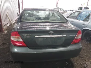 2004 Toyota Camry LE with VIN 4T1BE30K54U377818, listed as a IAAI auction lot 41931027 with 212,690 mi miles. Bid and sale history available at carsss.com. Image 16.