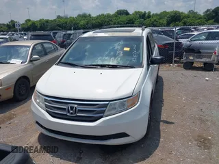 2012 Honda Odyssey EX-L with VIN 5FNRL5H63CB063684, listed as a IAAI auction lot 42576742 with 170,656 mi miles and . Bid and sale history available at DreamBid. Image 12.