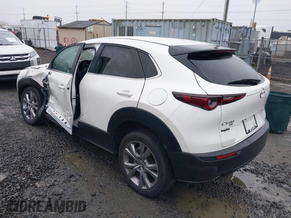 2021 Mazda CX-30 Select with VIN 3MVDMBBL3MM205256, listed as a IAAI auction lot 41302313 with 17,709 mi miles and . Bid and sale history available at DreamBid. Image 3.