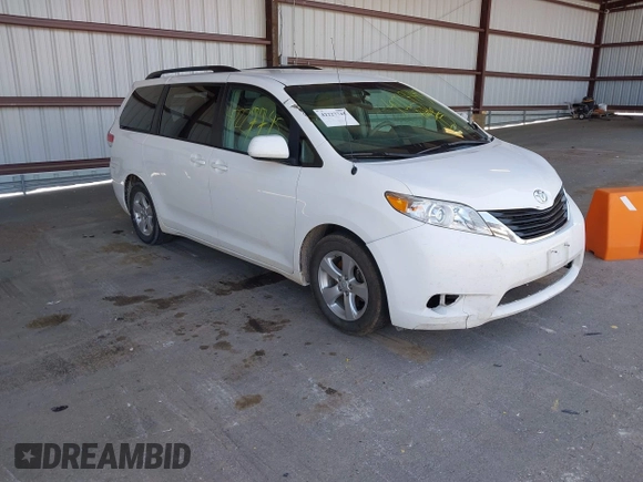 2014 Toyota Sienna LE AAS with VIN 5TDKK3DC2ES434546, listed as a IAAI auction lot 42227745 with 175,445 mi miles and . Bid and sale history available at DreamBid. Image 1.