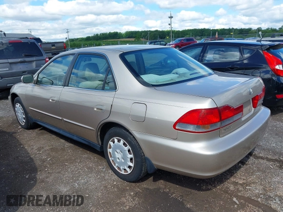2001 Honda Accord LX with VIN 1HGCG66501A005789, listed as a IAAI auction lot 42217613 with 135,801 mi miles and . Bid and sale history available at DreamBid. Image 3.