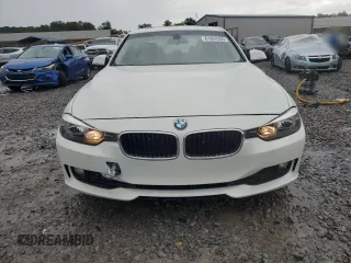 2014 BMW 3 Series 320i xDrive with VIN WBA3C3G50ENS67198, listed as a Copart auction lot 61654205 with 86,126 mi miles and Salvage title. Bid and sale history available at DreamBid. Image 5.