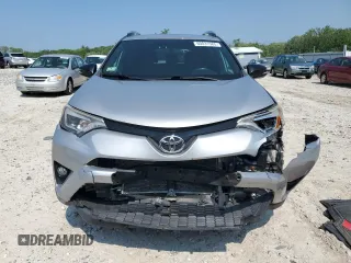 2016 Toyota RAV4 SE with VIN 2T3JFREV4GW531364, listed as a Copart auction lot 60031585 with 147,741 mi miles and Salvage title. Bid and sale history available at DreamBid. Image 5.
