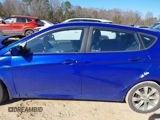 2013 Hyundai Accent SE with VIN KMHCU5AEXDU069605, listed as a IAAI auction lot 41320851 with 110,295 mi miles. Bid and sale history available at carsss.com. Image 14.