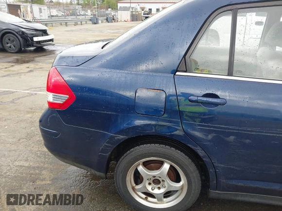 2007 Nissan Versa 1.8 SL with VIN 3N1BC11E67L420474, listed as a IAAI auction lot 41887735 with 199,094 mi miles. Bid and sale history available at carsss.com. Image 18.