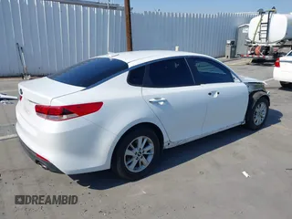 2016 Kia Optima LX z VIN 5XXGT4L3XGG019697, wystawiony jako IAAI lot #42449350 z przebiegiem 87 769 mil mil oraz . Historia ofert i sprzedaży dostępna na DreamBid. Obrazek 4.