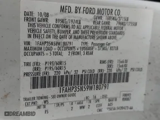 2009 Ford Focus SE with VIN 1FAHP35N59W180791, listed as a IAAI auction lot 42041573 with 201,464 mi miles. Bid and sale history available at carsss.com. Image 9.