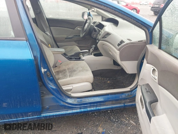 2012 Honda Civic LX z VIN 2HGFB2F54CH535126, wystawiony jako IAAI lot #42481363 z przebiegiem Nie podano mil oraz . Historia ofert i sprzedaży dostępna na DreamBid. Obrazek 5.