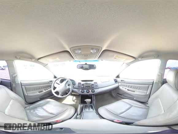 2002 Toyota Camry XLE z VIN 4T1BF32K12U519069, wystawiony jako Copart lot #55501405 z przebiegiem 186 142 mil mil oraz Szkoda całkowita • Salvage title. Historia ofert i sprzedaży dostępna na DreamBid. Obrazek 14.