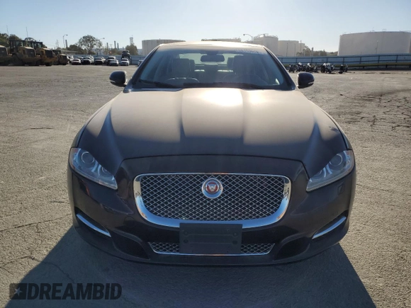 2014 Jaguar XJ with VIN SAJWA1CZ3E8V69877, listed as a Copart auction lot 48159005 with 57,567 mi miles and Clean Title. Bid and sale history available at DreamBid. Image 5.