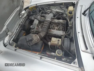 1990 Alfa Romeo Spider z VIN ZARBA12T0L6002373, wystawiony jako Copart lot #75362404 z przebiegiem 73 479 mil mil oraz Nie do naprawy • Non repairable. Historia ofert i sprzedaży dostępna na DreamBid. Obrazek 11.