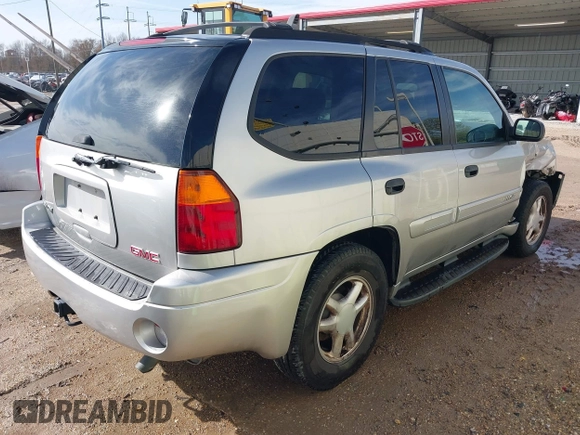 2005 GMC Envoy SLE with VIN 1GKDS13S252284455, listed as a IAAI auction lot 41455172 with 171,559 mi miles and . Bid and sale history available at DreamBid. Image 4.