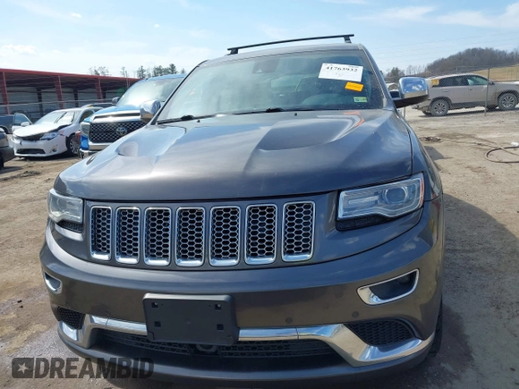 2014 Jeep Grand Cherokee Summit with VIN 1C4RJFJM5EC377129, listed as a IAAI auction lot 41763932 with 187,561 mi miles and . Bid and sale history available at DreamBid. Image 12.