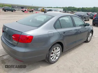 2012 Volkswagen Jetta SE z VIN 3VWDP7AJ2CM009780, wystawiony jako IAAI lot #42501489 z przebiegiem 122 185 mil mil oraz . Historia ofert i sprzedaży dostępna na DreamBid. Obrazek 4.