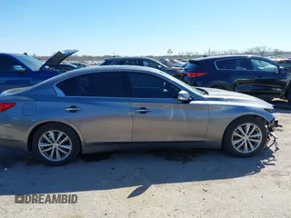 2015 Infiniti Q50 Premium with VIN JN1BV7AP3FM343677, listed as a IAAI auction lot 41811842 with 110,486 mi miles. Bid and sale history available at carsss.com. Image 14.