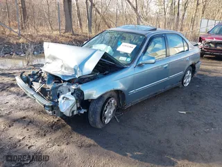 1999 Honda Civic EX with VIN 2HGEJ8643XH511334, listed as a IAAI auction lot 41851364 with 142,632 mi miles. Bid and sale history available at carsss.com. Image 2.