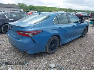 2023 Toyota Camry SE with VIN 4T1G11AK2PU080918, listed as a IAAI auction lot 42176340 with 29,740 mi miles and . Bid and sale history available at DreamBid. Image 4.