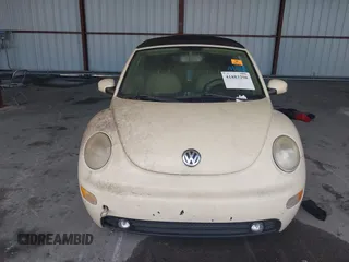 2003 Volkswagen Beetle GLS z VIN 3VWCK21Y33M309841, wystawiony jako IAAI lot #41883298 z przebiegiem 169 430 mil mil oraz . Historia ofert i sprzedaży dostępna na DreamBid. Obrazek 6.