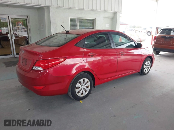 2015 Hyundai Accent GLS with VIN KMHCT4AE2FU888995, listed as a IAAI auction lot 42145256 with 160,918 mi miles. Bid and sale history available at carsss.com. Image 4.