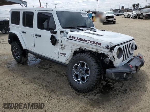 2023 Jeep Wrangler Rubicon with VIN 1C4HJXFG3PW691724, listed as a Copart auction lot 50985745 with 32,377 mi miles and Salvage title. Bid and sale history available at DreamBid. Image 4.