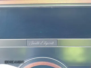 1986 Cadillac Seville z VIN 1G6KS6989GU813079, wystawiony jako IAAI lot #41732353 z przebiegiem Nie podano mil oraz . Historia ofert i sprzedaży dostępna na DreamBid. Obrazek 15.