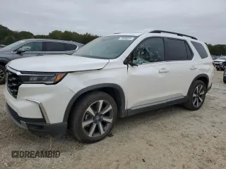 2024 Honda Pilot Touring z VIN 5FNYG2H74RB011187, wystawiony jako Copart lot #79999324 z przebiegiem 16 123 mil mil oraz Szkoda całkowita • Salvage title. Historia ofert i sprzedaży dostępna na DreamBid. Obrazek 1.