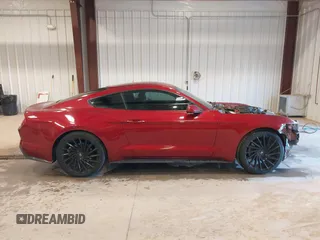 2017 Ford Mustang V6 z VIN 1FA6P8AMXH5309985, wystawiony jako IAAI lot #41501211 z przebiegiem 63 885 mil mil oraz . Historia ofert i sprzedaży dostępna na DreamBid. Obrazek 14.