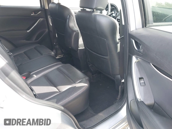 2016 Mazda CX-5 Grand Touring with VIN JM3KE4DYXG0647802, listed as a IAAI auction lot 41996854 with 85,774 mi miles. Bid and sale history available at carsss.com. Image 8.