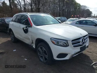 2019 Mercedes-Benz GLC with VIN WDC0G4KB3K1005332, listed as a IAAI auction lot 41774506 with 73,934 mi miles. Bid and sale history available at carsss.com. Image 1.