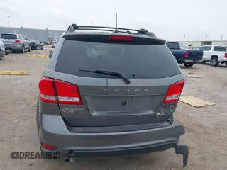 2013 Dodge Journey SXT with VIN 3C4PDDBGXDT650886, listed as a IAAI auction lot 41864331 with 224,579 mi miles and . Bid and sale history available at DreamBid. Image 16.