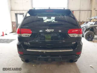 2014 Jeep Grand Cherokee Overland with VIN 1C4RJFCM4EC386398, listed as a IAAI auction lot 41696113 with 119,110 mi miles. Bid and sale history available at carsss.com. Image 16.