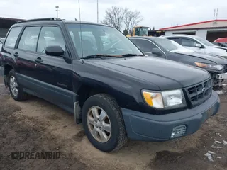 1999 Subaru Forester L with VIN JF1SF6351XH702931, listed as a IAAI auction lot 41612373 with 149,171 mi miles. Bid and sale history available at carsss.com. Image 1.