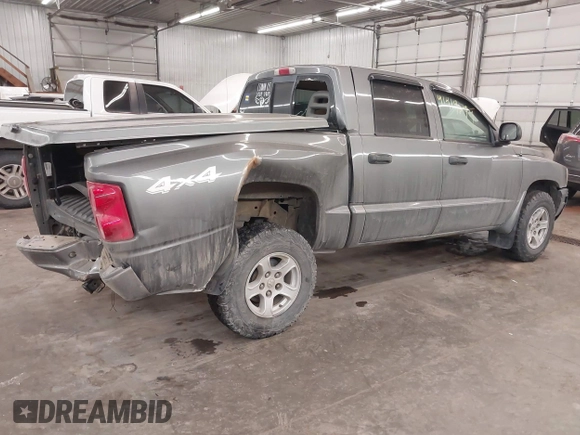 2007 Dodge Dakota SLT z VIN 1D7HW48J17S138642, wystawiony jako IAAI lot #41419794 z przebiegiem 79 350 mil mil oraz . Historia ofert i sprzedaży dostępna na DreamBid. Obrazek 4.