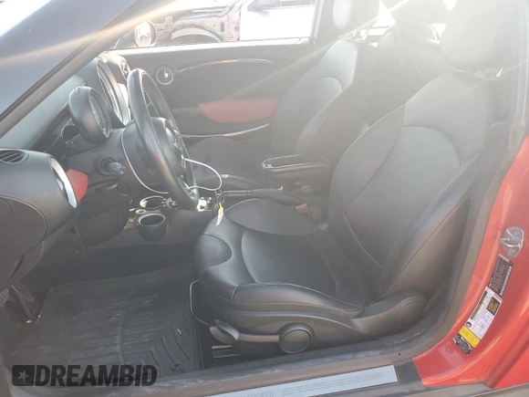 2012 MINI Cooper Coupe with VIN WMWSX1C5XCT163790, listed as a Copart auction lot 73148734 with 144,323 mi miles and Salvage Title. Bid and sale history available at carsss.com. Image 7.