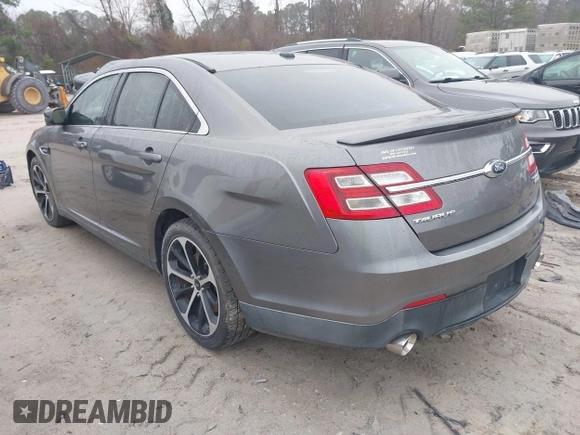 2014 Ford Taurus SHO with VIN 1FAHP2KT0EG171336, listed as a IAAI auction lot 41566688 with 154,328 mi miles. Bid and sale history available at carsss.com. Image 3.